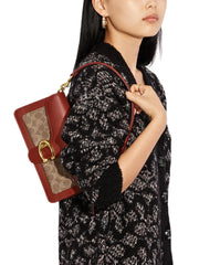 on-model-Coach-Tabby-Shoulder-Bag-26-In-Signature-Canvas-Tan-Rust