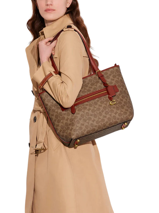 on-model-Coach-Taylor-Tote-In-Signature-Canvas-Tan-Rust