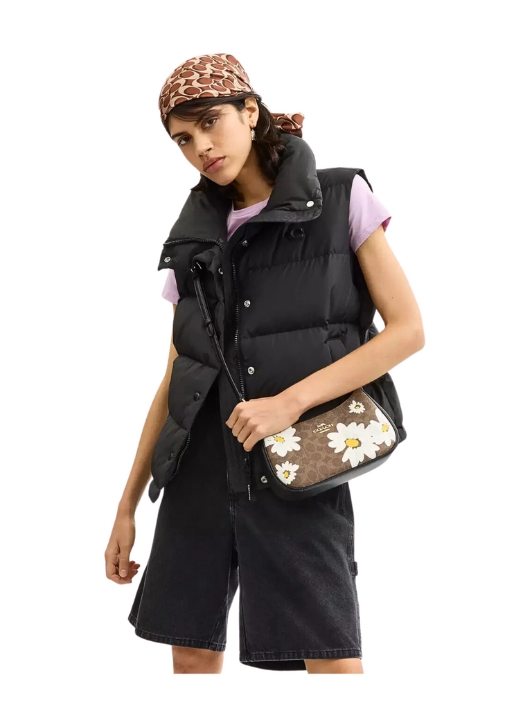 on-model-Coach-Teri-In-Signature-Canvas-With-FloraL-Print-Tan-Multi
