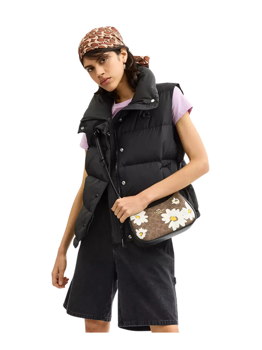 on-model-Coach-Teri-In-Signature-Canvas-With-FloraL-Print-Tan-Multi