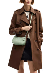 on-model-Coach-Teri-Mini-Crossbody-Bag-Signature-Leather-Heart-Charm-Pale-Green