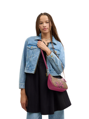 on-model-Coach-Teri-Shoulder-Bag-In-Signature-Canvas-With-Bow-Print-Tan-Pink-Multi