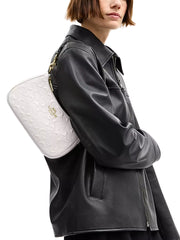 on-model-Coach-Teri-Shoulder-Bag-In-Signature-Leather-With-Heart-Charm-Chalk