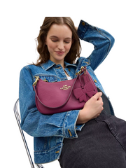 on-model-Coach-Teri-Shoulder-Bag-With_Bow-Charm-Pink