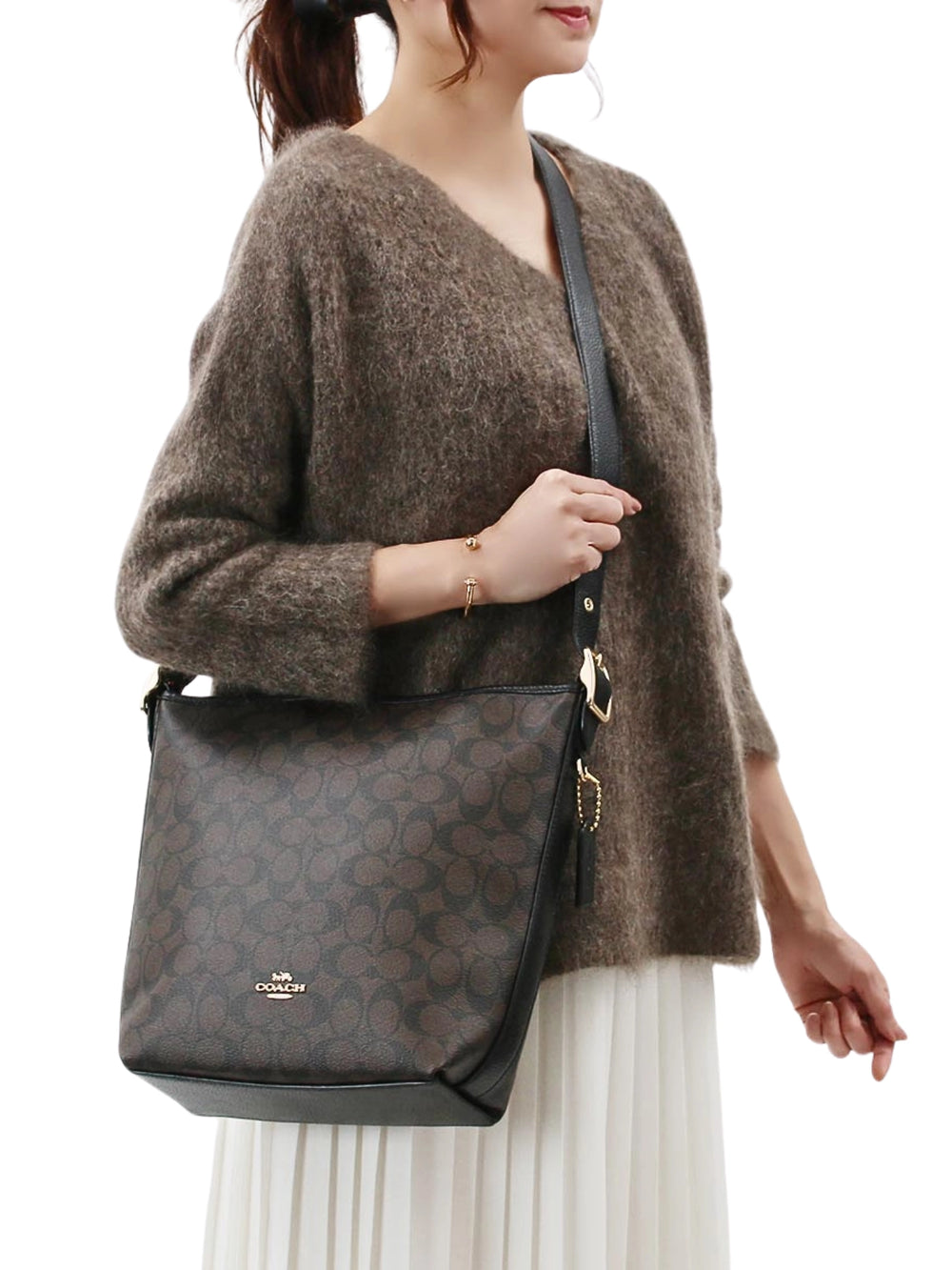 on-model-Coach-Val-Duffle-Signature-Canvas-Brown-Black