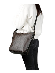 on-model-Coach-Val-Duffle-Signature-Canvas-Brown-Black