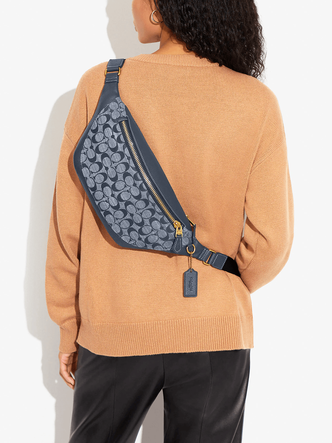 on-model-Coach-Warren-Belt-Bag-In-Signature-Chambray-Denim