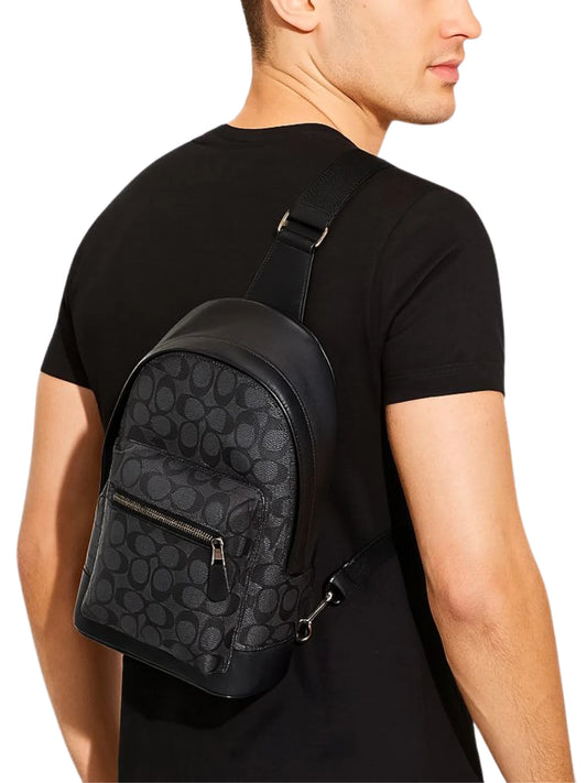 on-model-Coach-West-Pack-In-Signature-Canvas-Charcoal-Black