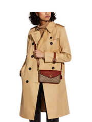 on-model-Coach-Wyn-Crossbody-In-Signature-Canvas-Tan-Rust