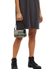 on-model-Coach-X-Mint_Serf-Nolita-19-In-Signature-Canvas-Khaki-Multi