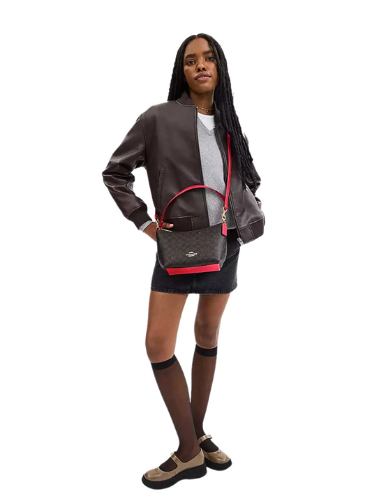 on-model-Coach-Zip-Shoulder-Bag-In-Signature-Canvas-Walnut-Bold-Red