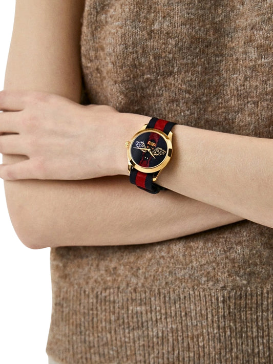 on-model-Gucci-G-Timeless-Bee-Red-_-Blue-Dial-Red-Two-Tone-Nylon-Strap-Watch
