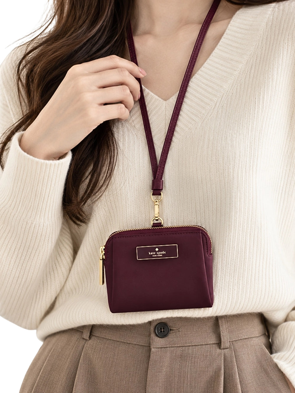 on-model-Kate-Spade-Carter-Nylon-Card-Case-Lanyard-Deep-Cherry