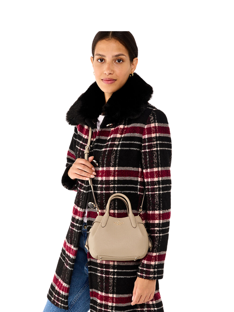 on-model-Kate-Spade-Dumpling-Pebbled-Leather-Mini-Triple-Compartment-Satchel-Light-Sand