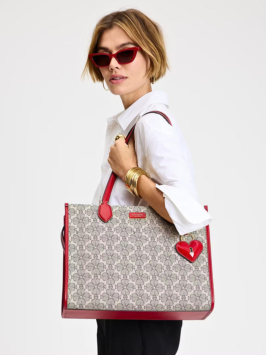 on-model-Kate-Spade-Flower-Coated-Canvas-Large-Market-Tote-Cherry-Rouge-Multi