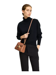 on-model-Kate-Spade-Katy-Small-Top-handle-Bag-Deep-Cherry-Allspice-Cake