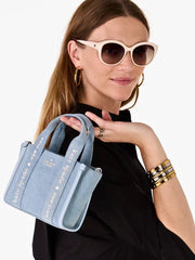 on-model-Kate-Spade-Kip-Denim-Mini-Tote-Blue-Multicolor