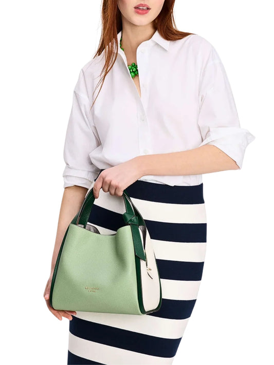 on-model-Kate-Spade-Knott-Colorblocked-Medium-Crossbody-Tote-in-Beach-Glass-Multi