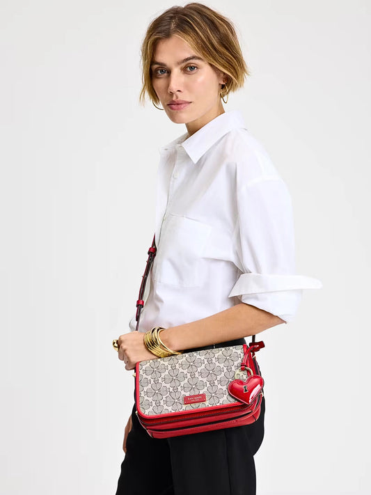 on-model-Kate-Spade-Liv-Spade-Flower-Coated-Canvas-Small-Flap-Crossbody-Cherry-Rouge-Multi