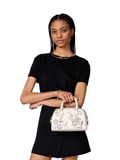 on-model-Kate-Spade-Madison-Perforated-Small-Dolly-Duffle-Meringue