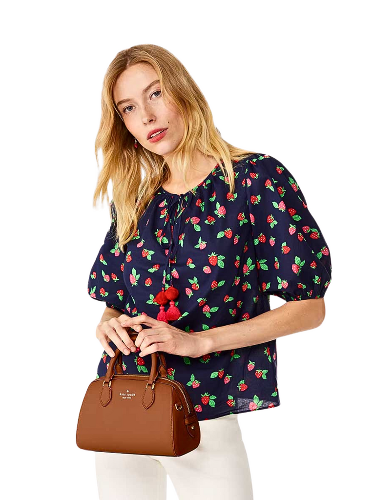 on-model-Kate-Spade-Madison-Saffiano-Leather-Duffle-Crossbody-Bag-Cavern-Clay