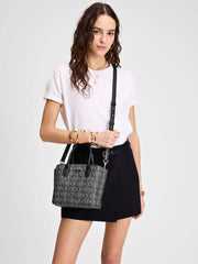 on-model-Kate-Spade-Suite-Spade-Flower-Coated-Canvas-Crossbody-Tote-Black-Multi