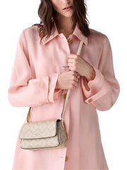 on-model-Kate-Spade-Sutton-Spade-Flower-Mini-Flap-Crossbody-Dark-Beige-Moon-Dust