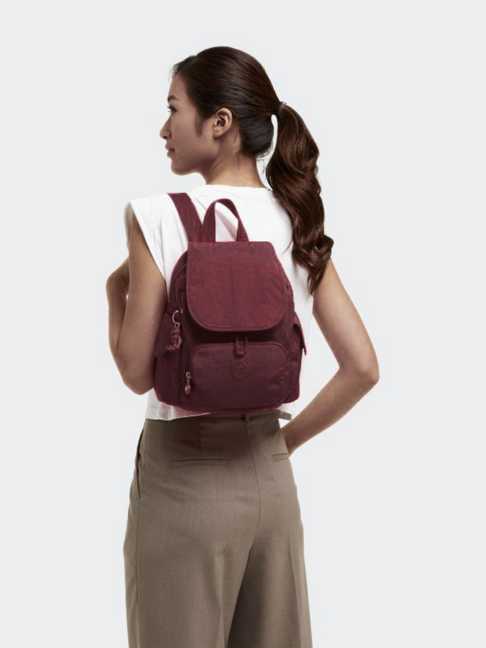on-model-Kipling-Marigold-Backpack-Mahogany