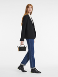 on-model-Longchamp-Le-Pliage-City-Top-Handle-Pouch-Black