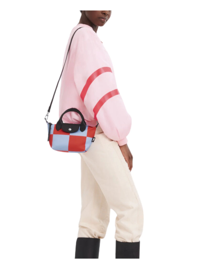 on-model-Longchamp-Le-Pliage-Special-Collection-Extra-Small-Crossbody-Bag-Sky-Blue-RedWEBP