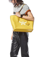 on-model-MCM-Himmel-Shopper-Bag-in-Lauretos-Lemon-Gold