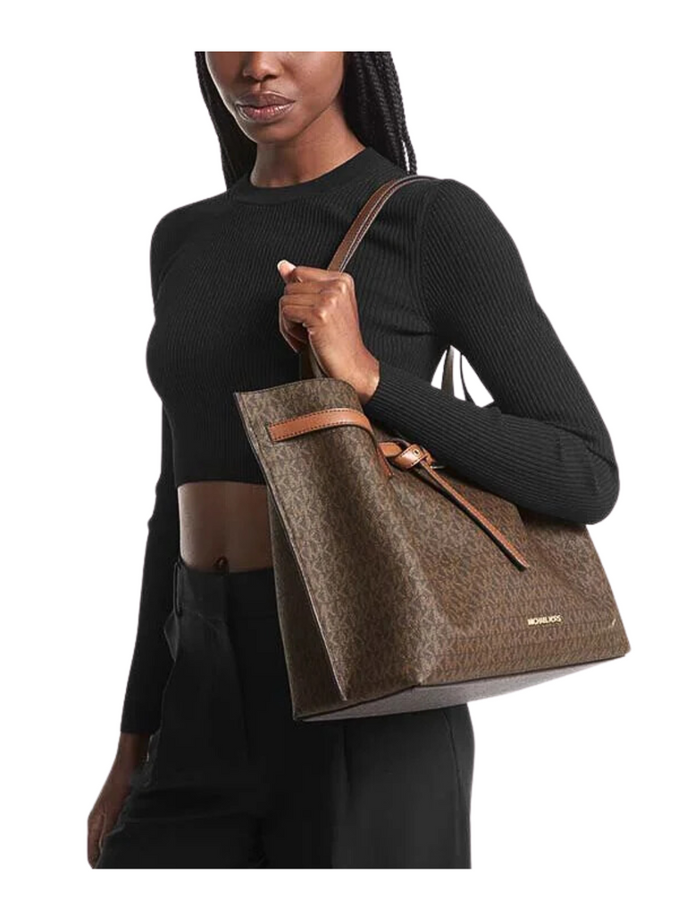 on-model-Michael-Kors-Emilia-Large-Logo-Tote-Bag-Brown