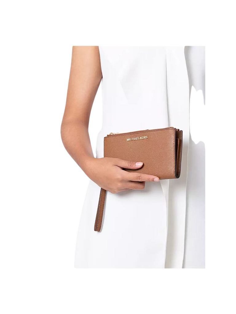 on-model-Michael-Kors-Jet-Set-Travel-Double-Zip-Wrislet-Luggage