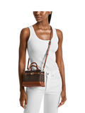 on-model-Michael-Kors-Reed-Extra-Small-Signature-Logo-Satchel-Brown