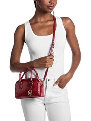 on-model-Michael-Kors-Thompson-Extra-Small-Distressed-Convertible-Satchel-Cherry