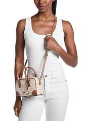 on-model-Michael-Kors-Thompson-Extra-Small-Signature-Logo-Convertible-Satchel-Bag-Vanilla