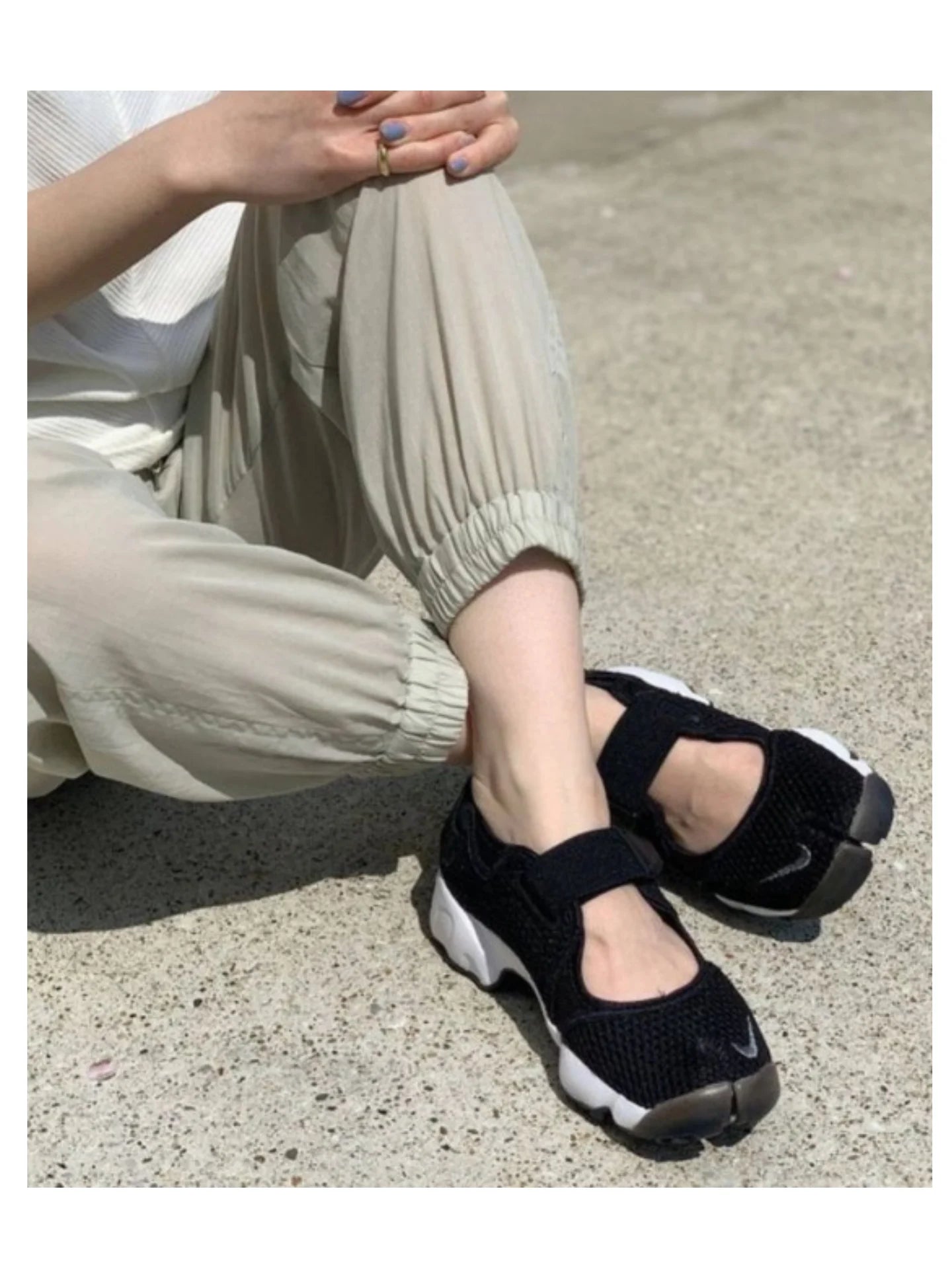 on-model-Nike-Air-Rift-Breathe-BlackWhiteCool-GreyWEBP