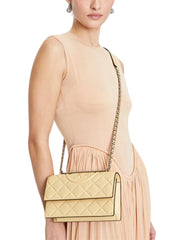 on-model-Tory-Burch-Fleming-Small-Convertible-Shoulder-Bag-Vanilla-Soft-Serve
