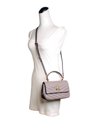 on-model-Tory-Burch-Kira-Chevron-Top-Handle-Bag-Gray-Heron