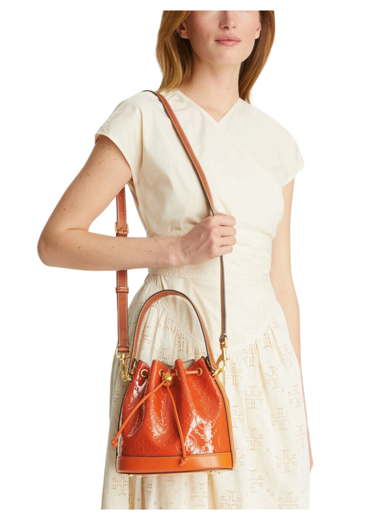 on-model-Tory-Burch-T-Monogram-Patent-Embossed-Bucket-Bag-Spring-Spice