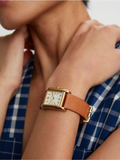 on-model-Tory -Burch-Eleanor-Leather-Strap /Gold-Tone- Stainless- Steel -Watch -Luggage