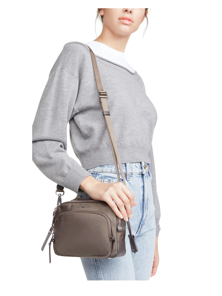 on-model-Tumi-Voyageur-Troy-Crossbody-Bag-ZincWEBP