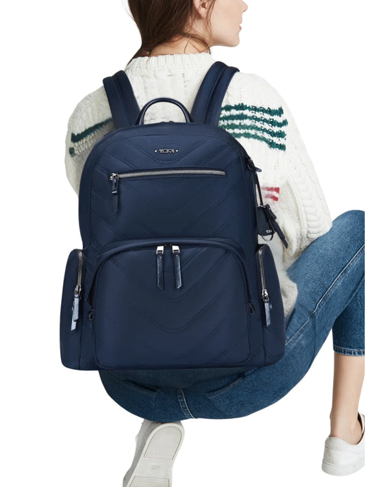 on-model-Voyageur-Caren-Backpack-Quilted-River-Blue-Tumi-balilene