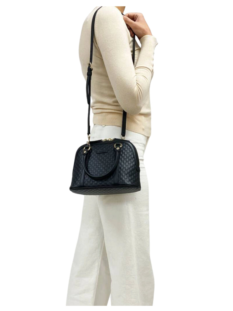 on-model1-Gucci-Alma-Small-GG-Guccisimia-Dome-Satchel-Bag-Black