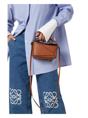 on-model1-Loewe-Mini-Puzzle-bag-in-classic-calfskin-TanWEBP