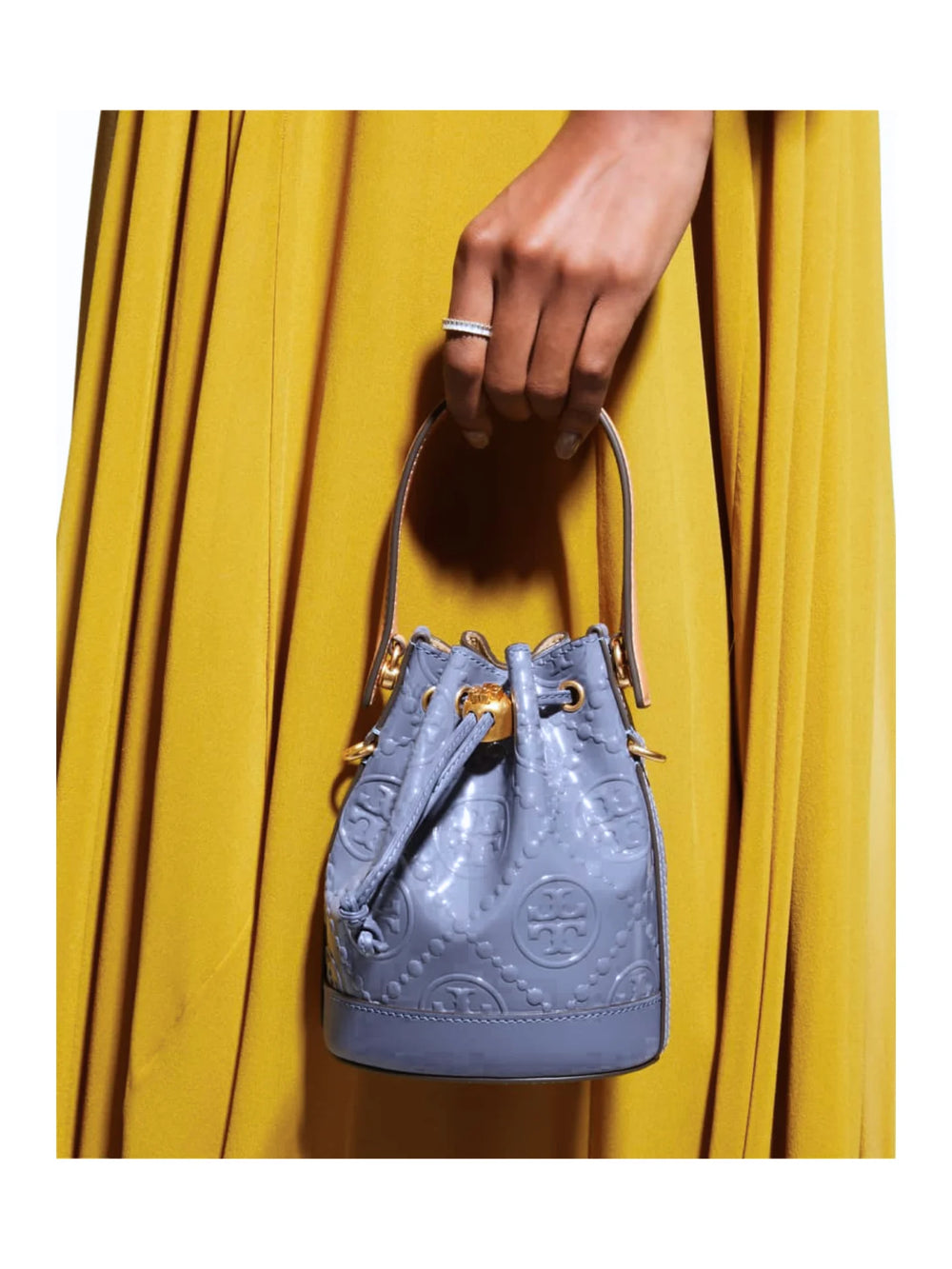 on-model1-Tory-Burch-T-Monogram-Patent-Embossed-Mini-Bucket-Bag-Dark-LotusWEBP