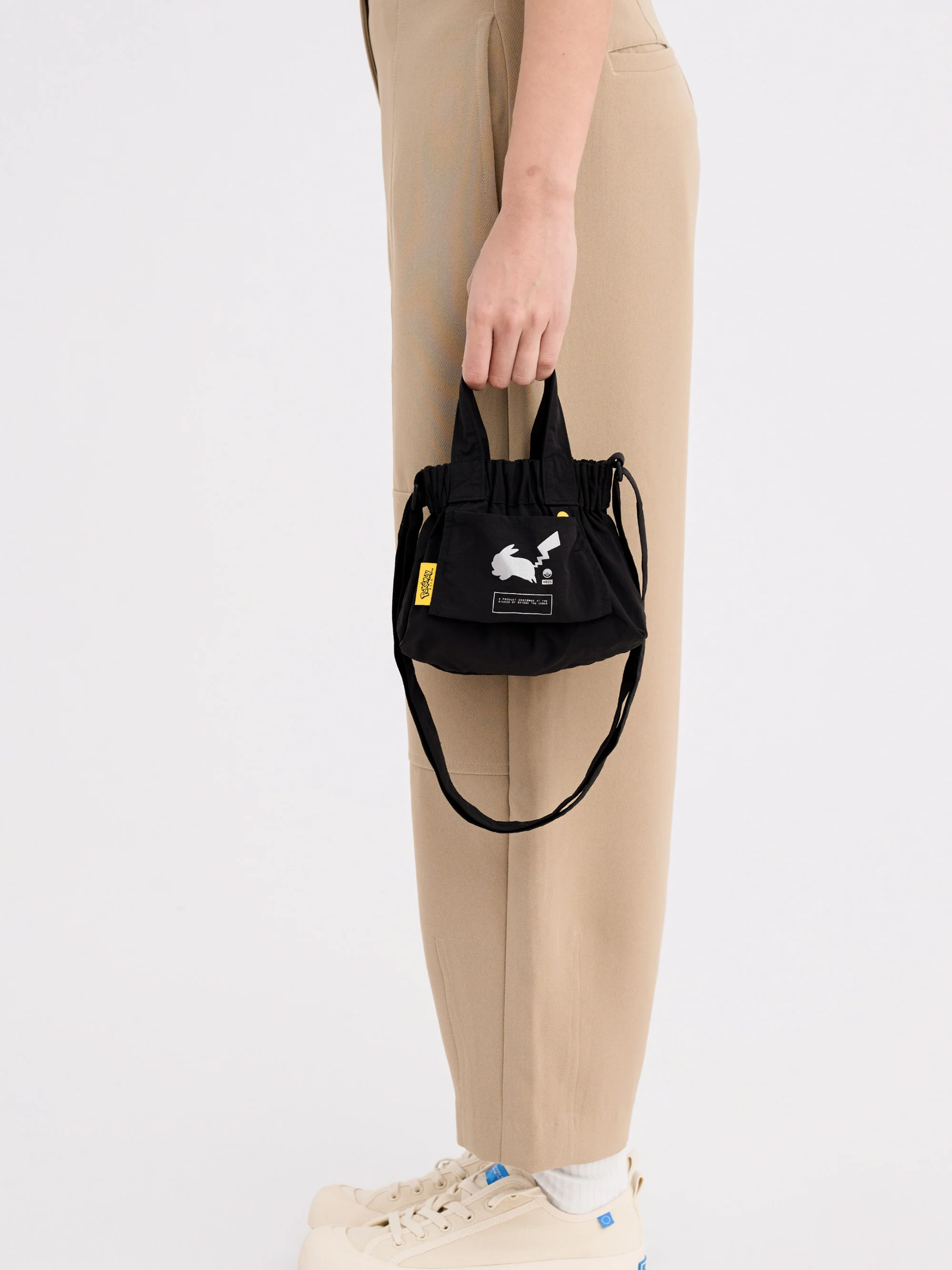 on-model2-Beyond-The-Vines-Pokemon-Micro-Dumpling-Bag-Black