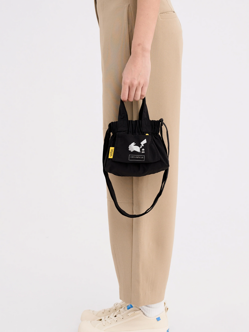 on-model2-Beyond-The-Vines-Pokemon-Micro-Dumpling-Bag-Black