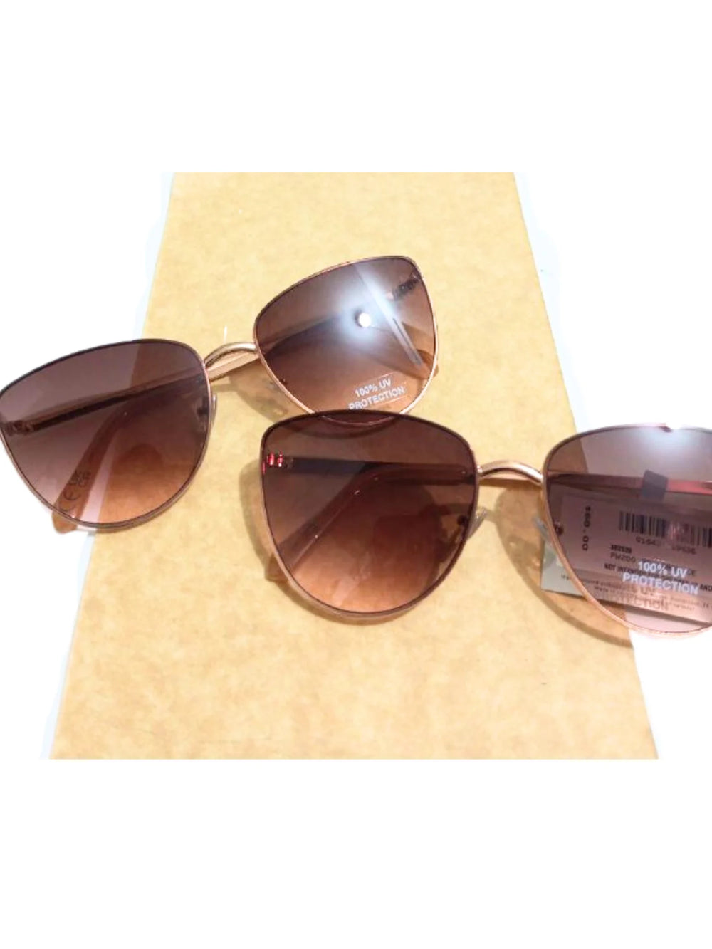 on-produkk-Fossil-X82528-Cat-Eye-Sunglasses-Rose-GoldWEBP