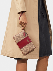 Coach Small Wristlet In Colorblock Signature Canvas Tan Rust